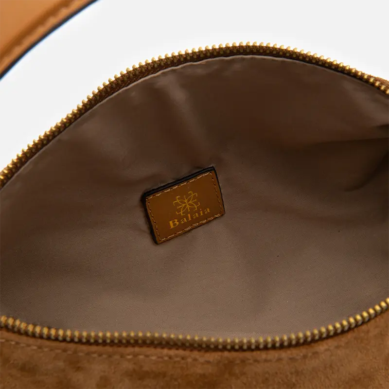 Bolsa Jade Cilíndrica em Camurça Sela