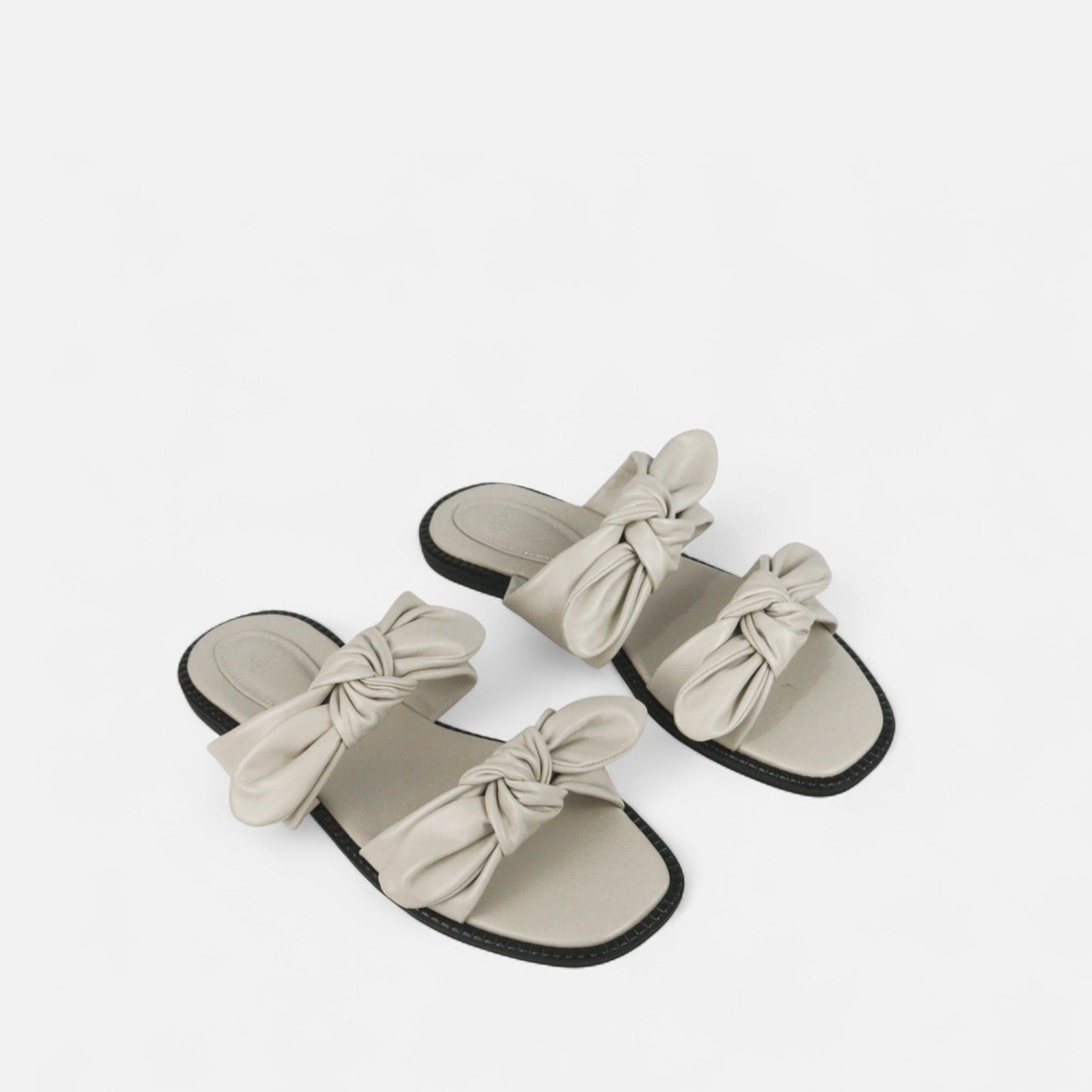 Rasteira Laços em Couro Off White - Balaia